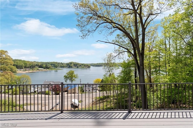 26 Oneida Trl, Malvern, OH 44644 - wooden deck with a water view