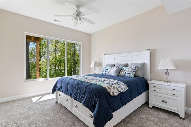26 Oneida Trl, Malvern, OH 44644 - bedroom featuring light colored carpet, baseboards, and ceiling fan