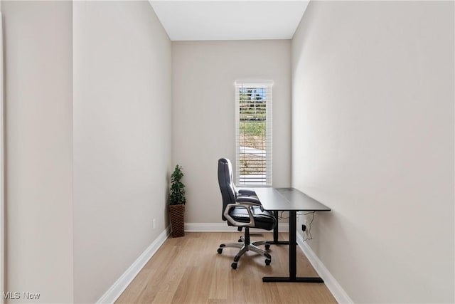 26 Oneida Trl, Malvern, OH 44644 - office area with light wood-style flooring and baseboards