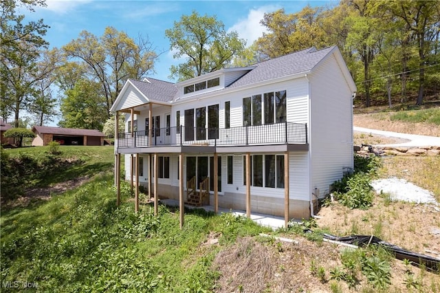 26 Oneida Trl, Malvern, OH 44644 - back of house featuring a balcony