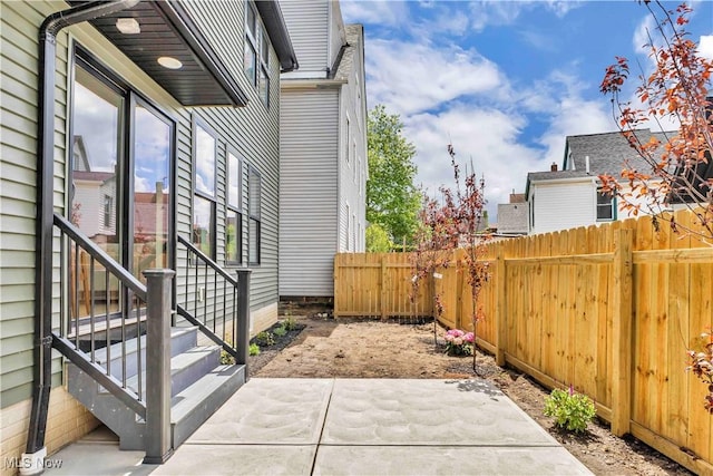 view of patio / terrace with entry steps and a fenced backyard