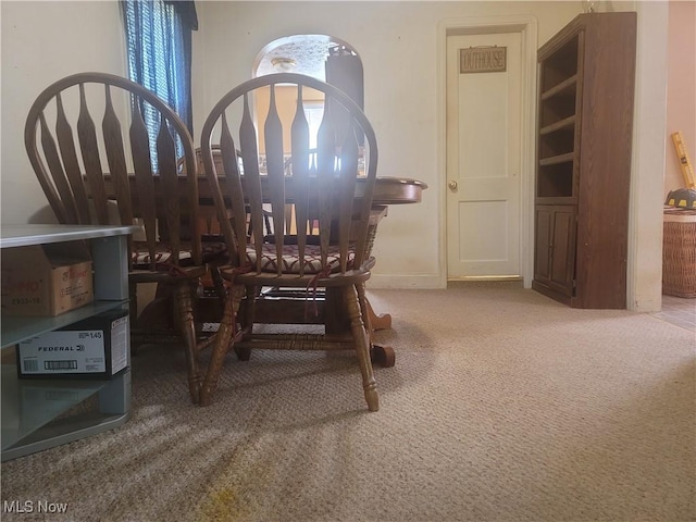 9788 E River Rd, Elyria, OH 44035 - dining space with carpet