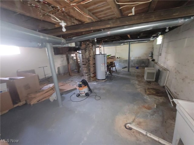 9788 E River Rd, Elyria, OH 44035 - unfinished below grade area with water heater