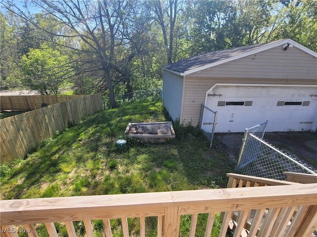 9788 E River Rd, Elyria, OH 44035 - view of yard with a detached garage and an outdoor structure
