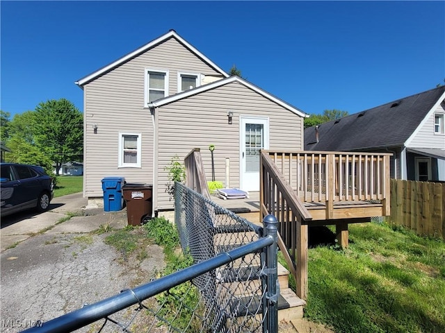 9788 E River Rd, Elyria, OH 44035 - back of property with a deck