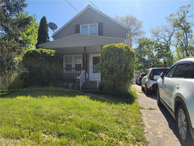 9788 E River Rd, Elyria, OH 44035 - view of front of property with a porch