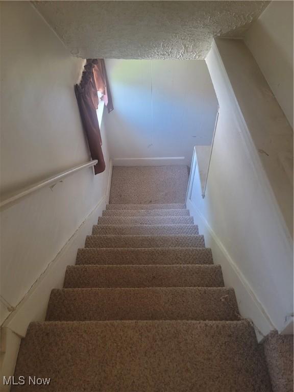 9788 E River Rd, Elyria, OH 44035 - stairs with carpet