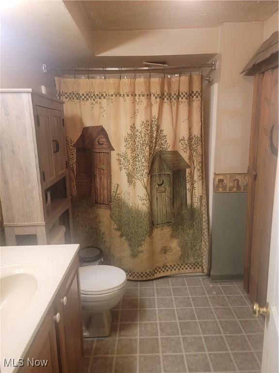 9788 E River Rd, Elyria, OH 44035 - full bath featuring toilet, a shower with shower curtain, and vanity