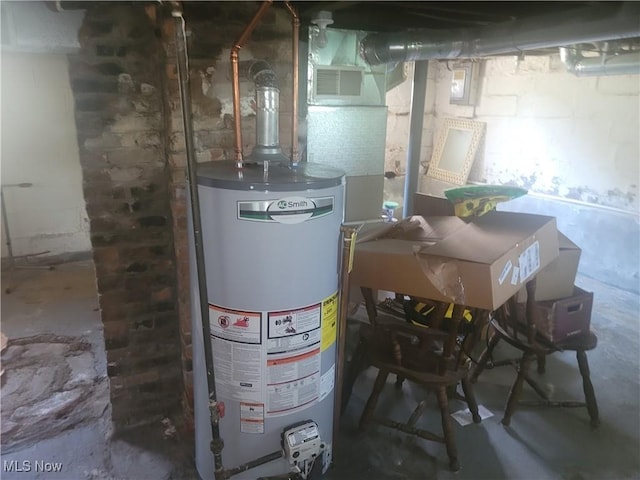 9788 E River Rd, Elyria, OH 44035 - utility room featuring gas water heater and a sink