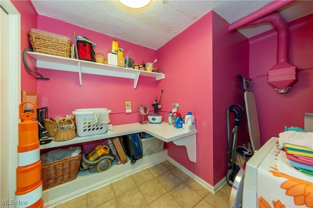 13710 Shaker Blvd Unit 405, Cleveland, OH 44120 - kitchen featuring baseboards and a textured ceiling
