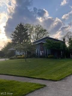 2840 Brian Dr, Parma, OH 44134 - view of home's community with a yard