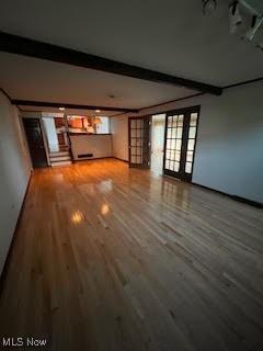 2840 Brian Dr, Parma, OH 44134 - unfurnished living room featuring wood finished floors