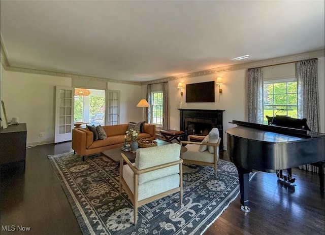 22099 Shaker Blvd, Shaker Heights, OH 44122 - living room featuring a fireplace, plenty of natural light, wood finished floors, and ornamental molding