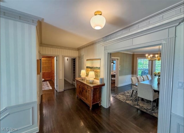 22099 Shaker Blvd, Shaker Heights, OH 44122 - corridor featuring ornamental molding, wallpapered walls, dark wood-style floors, a decorative wall, and a wainscoted wall