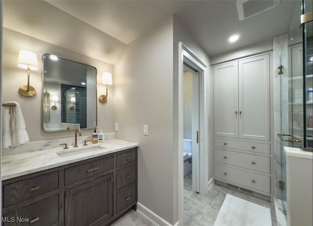 22099 Shaker Blvd, Shaker Heights, OH 44122 - bathroom featuring a stall shower, vanity, and baseboards