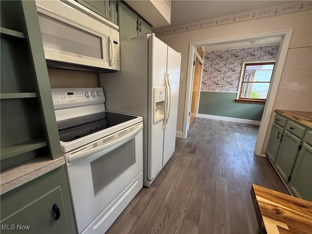 1707 Clairmont Ave, Cambridge, OH 43725 - kitchen with green cabinets, white appliances, wallpapered walls, dark wood-type flooring, and baseboards