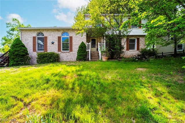 500 Stoneybrook Ln, Canfield, OH 44406 - view of front facade with brick siding and a front lawn