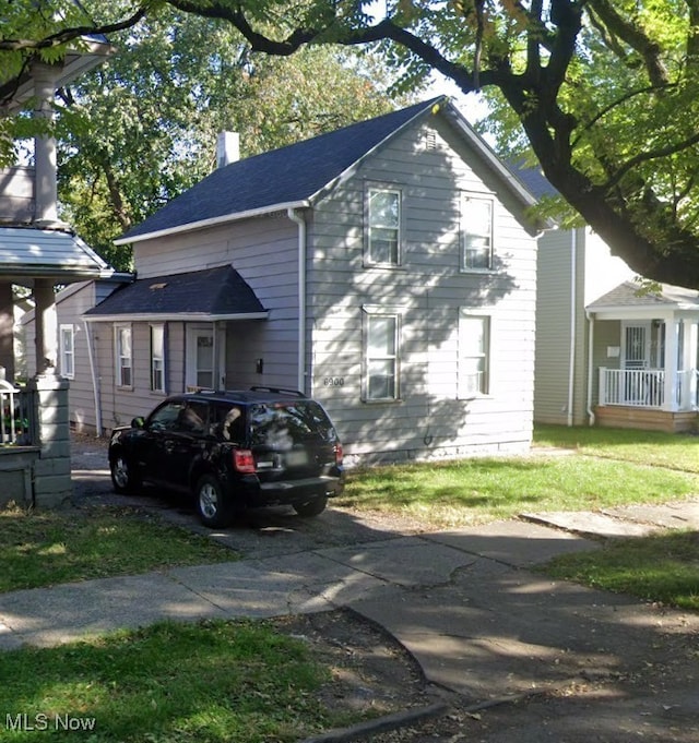 6900 Lawn Ave, Cleveland, OH 44102 - view of front of house with a chimney