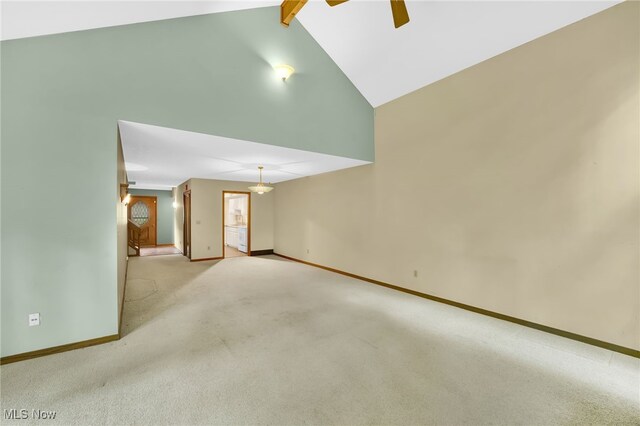 33 Brandon Pl, Rocky River, OH 44116 - carpeted empty room featuring a ceiling fan, high vaulted ceiling, and baseboards