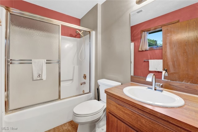 33 Brandon Pl, Rocky River, OH 44116 - full bathroom with toilet, vanity, combined bath / shower with glass door, and wood finished floors
