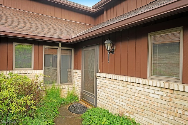 33 Brandon Pl, Rocky River, OH 44116 - property entrance featuring roof with shingles and brick siding