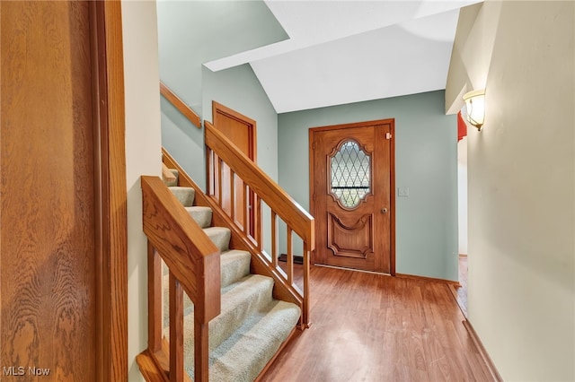 33 Brandon Pl, Rocky River, OH 44116 - foyer featuring stairway, wood finished floors, lofted ceiling, and baseboards