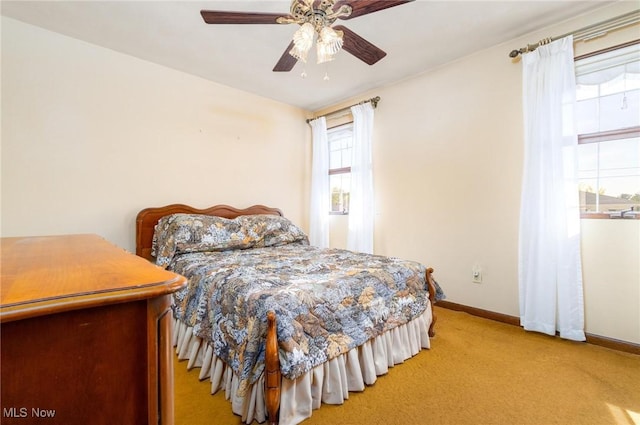 128 E Circle Dr, Weirton, WV 26062 - bedroom featuring light carpet, baseboards, and a ceiling fan