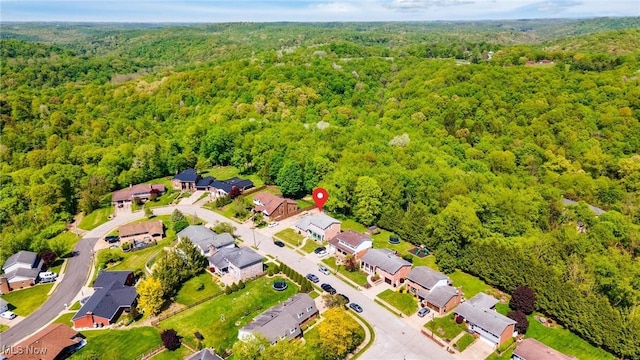 128 E Circle Dr, Weirton, WV 26062 - aerial overview of property's location featuring a heavily wooded area and nearby suburban area