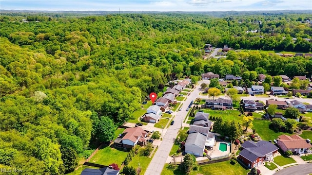 128 E Circle Dr, Weirton, WV 26062 - aerial perspective of suburban area featuring a heavily wooded area and a pool area