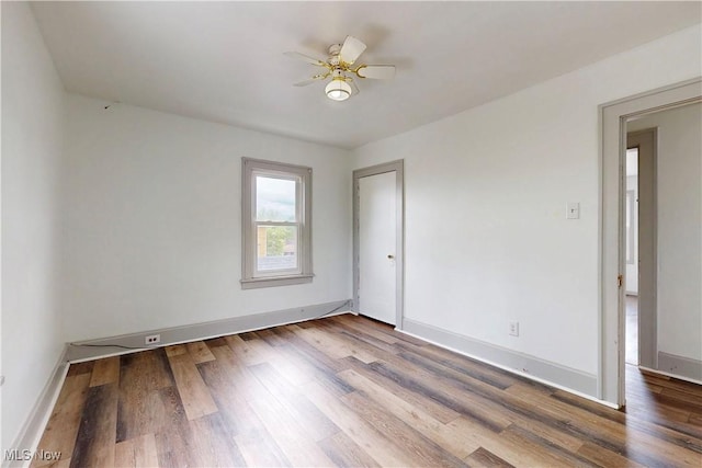 520 Lincoln Blvd, Steubenville, OH 43952 - empty room with ceiling fan, wood finished floors, and baseboards