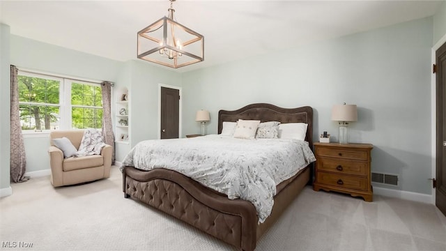 1251 Marwood Dr, Zanesville, OH 43701 - carpeted bedroom with a chandelier and baseboards