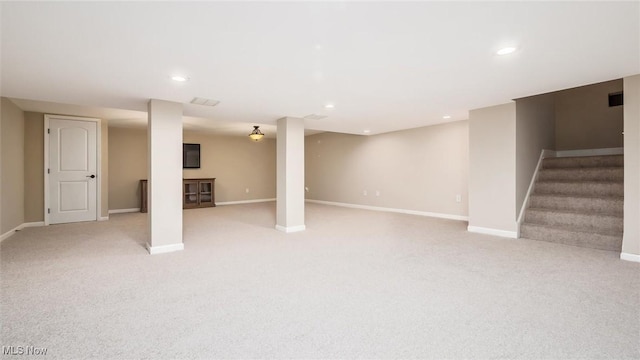 1251 Marwood Dr, Zanesville, OH 43701 - finished basement featuring light colored carpet, baseboards, stairs, and recessed lighting