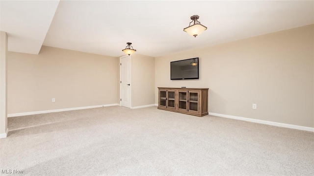 1251 Marwood Dr, Zanesville, OH 43701 - unfurnished living room featuring light carpet and baseboards