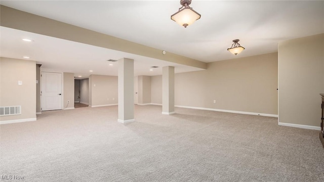 1251 Marwood Dr, Zanesville, OH 43701 - finished basement with light colored carpet, baseboards, and recessed lighting