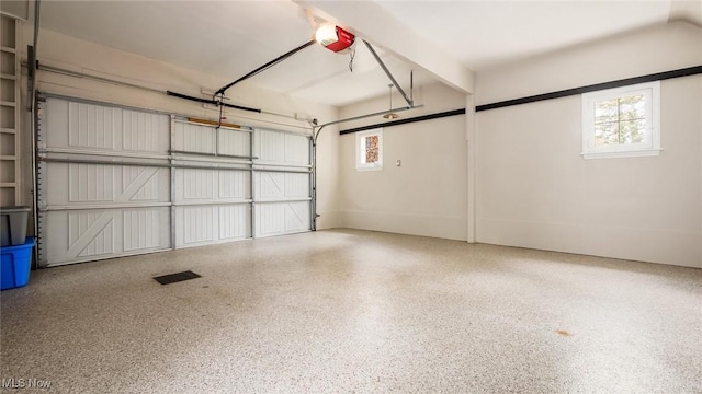 1251 Marwood Dr, Zanesville, OH 43701 - garage featuring a garage door opener