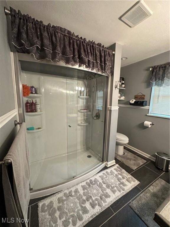567 Westfield Rd, East Liverpool, OH 43920 - full bathroom with toilet, a shower stall, tile patterned flooring, and baseboards