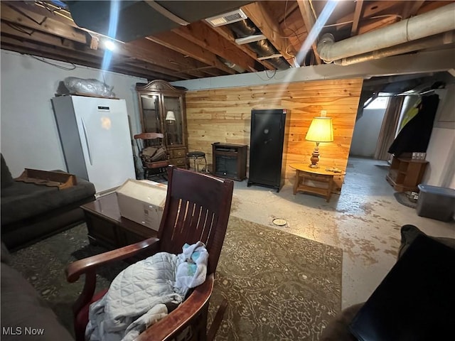 567 Westfield Rd, East Liverpool, OH 43920 - finished basement featuring wood walls and freestanding refrigerator