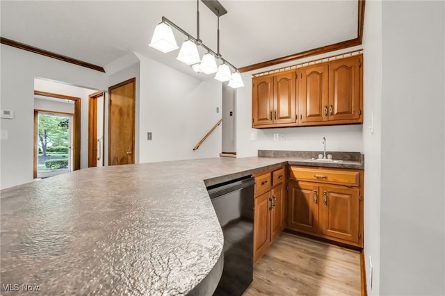 7456 Blue Ridge Dr, Mentor, OH 44060 - kitchen featuring dishwasher, crown molding, brown cabinets, light wood-style flooring, and a sink