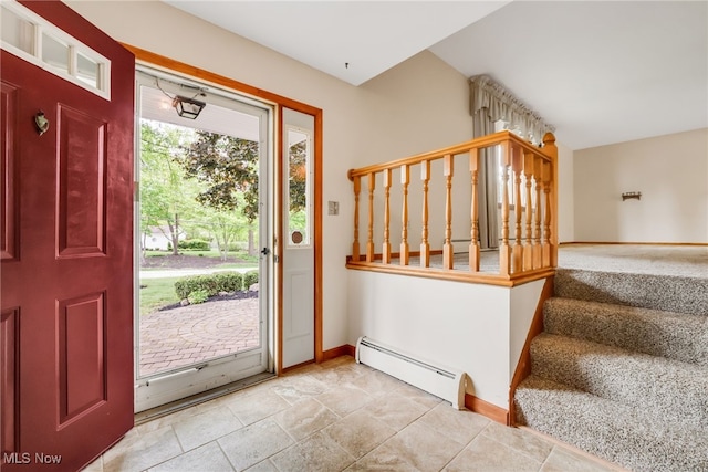 7456 Blue Ridge Dr, Mentor, OH 44060 - foyer with baseboard heating, baseboards, stairway, and stone finish flooring