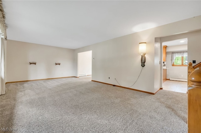 7456 Blue Ridge Dr, Mentor, OH 44060 - spare room with a baseboard radiator, carpet, and baseboards