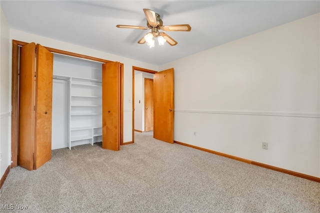 7456 Blue Ridge Dr, Mentor, OH 44060 - unfurnished bedroom with carpet flooring, a closet, baseboards, and ceiling fan