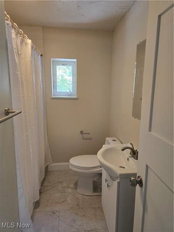 355 N Elm Ave, Tallmadge, OH 44278 - bathroom featuring marble look tiles, vanity, toilet, and a shower with shower curtain
