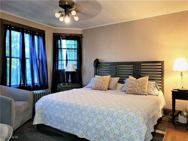 517 N 10th St, Cambridge, OH 43725 - bedroom featuring ornamental molding and wood finished floors