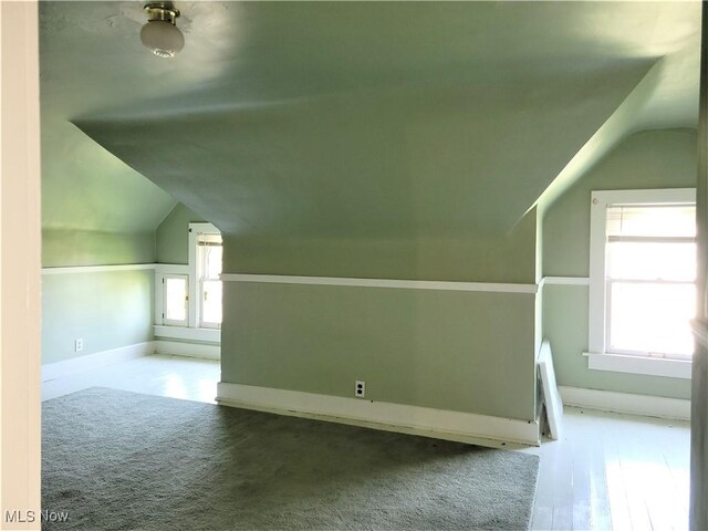 517 N 10th St, Cambridge, OH 43725 - bonus room featuring vaulted ceiling, baseboards, and carpet floors