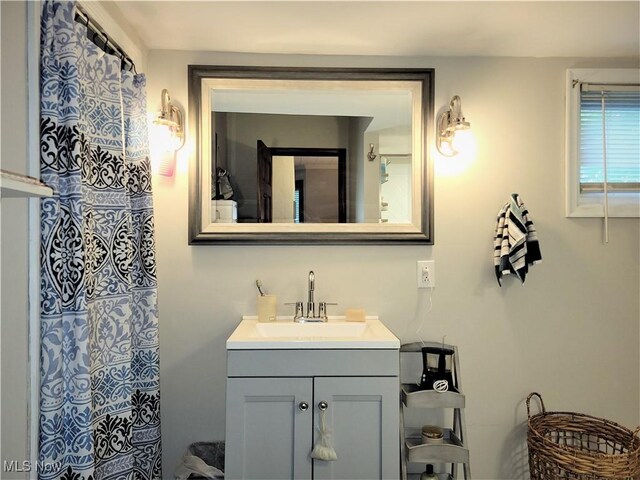 517 N 10th St, Cambridge, OH 43725 - bathroom featuring vanity and a shower with curtain