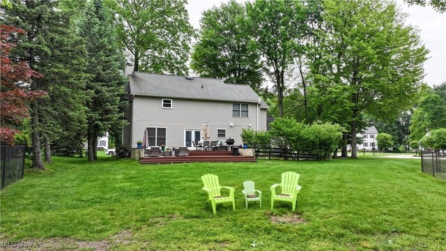 5472 Wixford Ln, Mentor, OH 44060 - rear view of house featuring a deck and a chimney