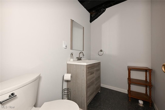4474 Litchfield Dr, Copley, OH 44321 - half bathroom with toilet, baseboards, and vanity