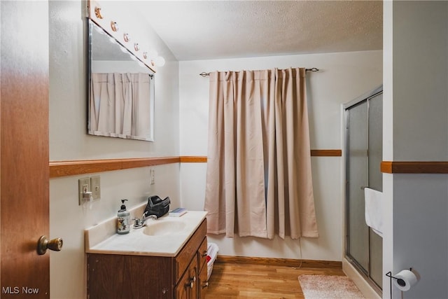 55 Lanham Ln, Davisville, WV 26142 - full bath featuring wood finished floors, a stall shower, and vanity