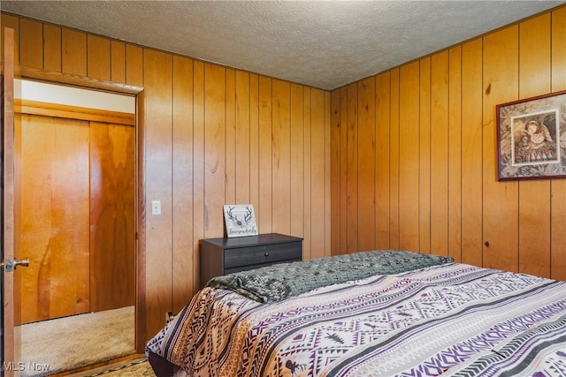 55 Lanham Ln, Davisville, WV 26142 - bedroom featuring carpet, a textured ceiling, and wood walls