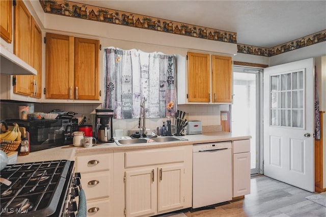 55 Lanham Ln, Davisville, WV 26142 - kitchen featuring dishwasher, a sink, light countertops, and tasteful backsplash